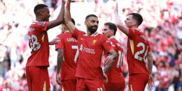 Liverpool Clinches Premier League Title in Style With Anfield Rout Over Tottenham