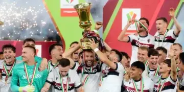 Photo of Bologna players celebrating their 1-0 Italian Cup Triumph Over AC Milan