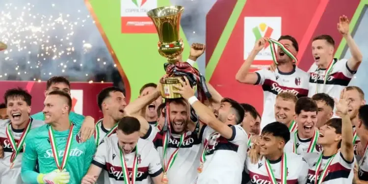 Photo of Bologna players celebrating their 1-0 Italian Cup Triumph Over AC Milan