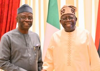 Photo of Pastor Tunde Bakare and President Tinubu
