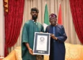 Photo of Tunde Onakoya and President Tinubu