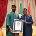 Photo of Tunde Onakoya and President Tinubu