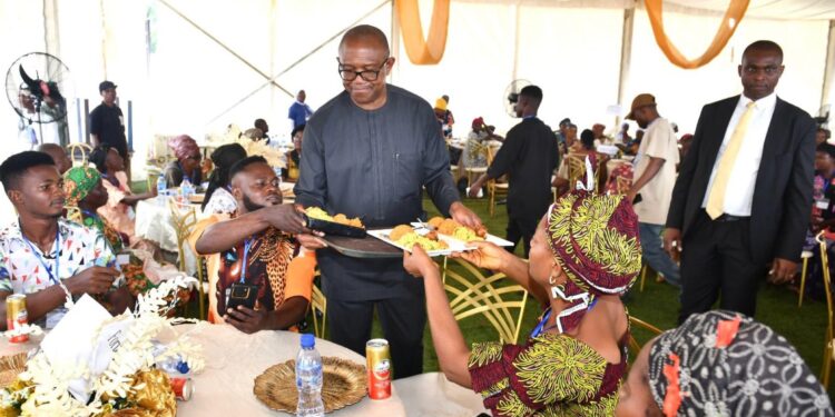 Photo of Peter Obi Serving Food
