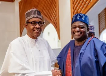 Photo of Muhammadu Buhari and Femi Adesina