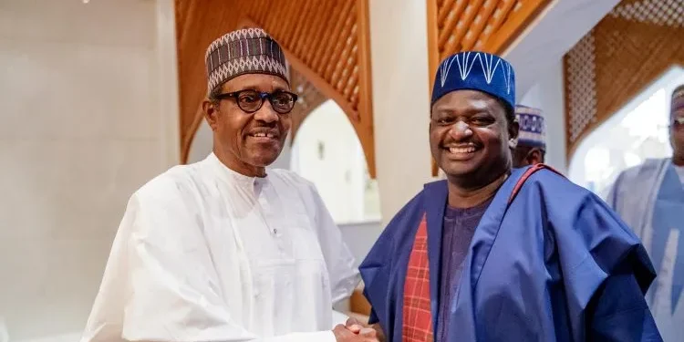Photo of Muhammadu Buhari and Femi Adesina