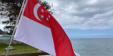 Singapore Maintains Exchange Rate Policy Amid Improved Trade Climate Banking