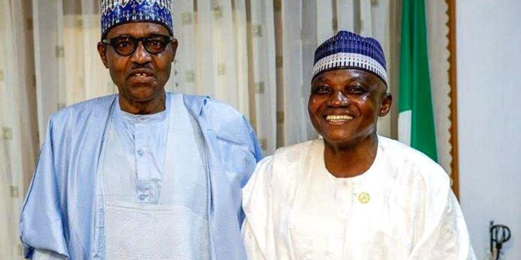 Garba Shehu with Late President Buhari