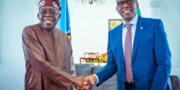 Photo of President Tinubu and Philip Pierre