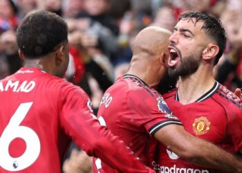Manchester United players celebrating a goal