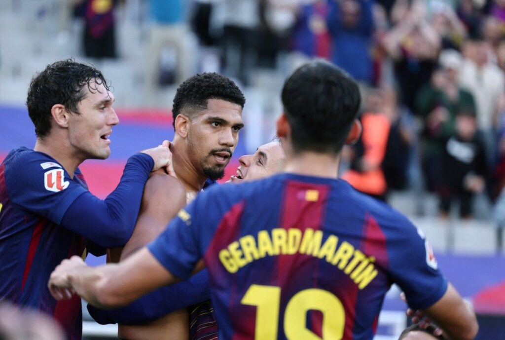 Araujo strikes late as Barcelona snatch win over Girona.