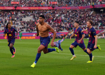 Araujo strikes late as Barcelona snatch win over Girona.