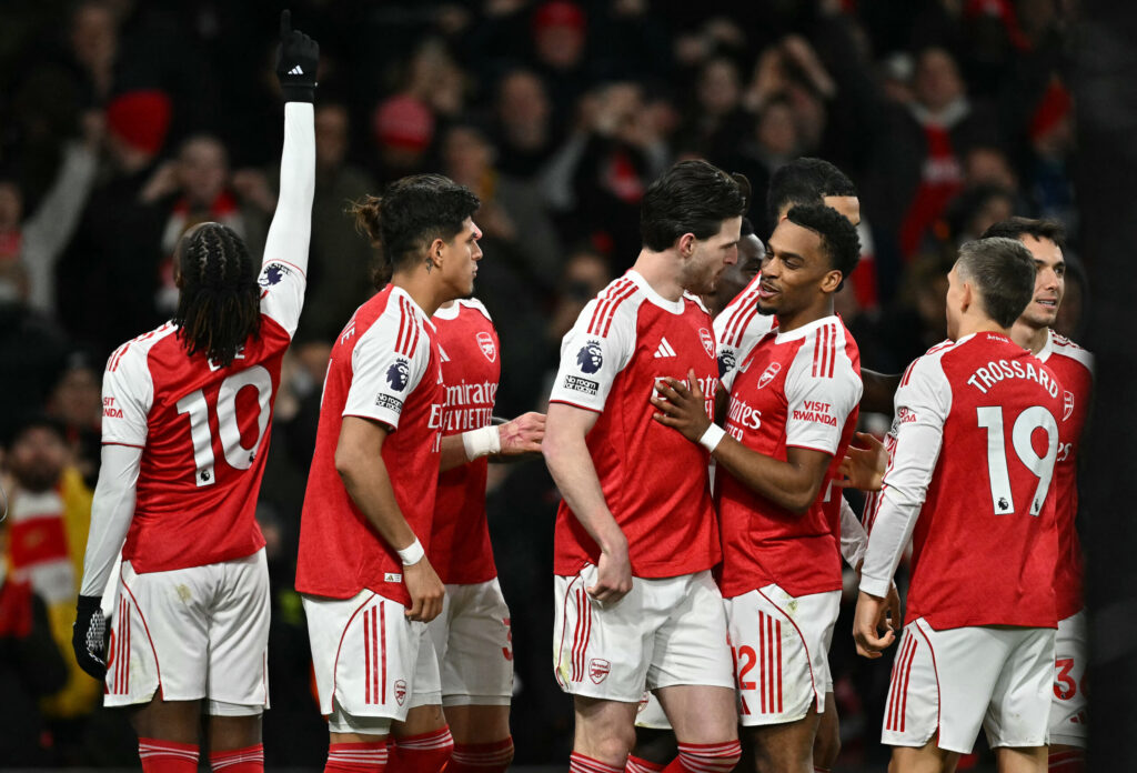 Arsenal players celebrate a goal