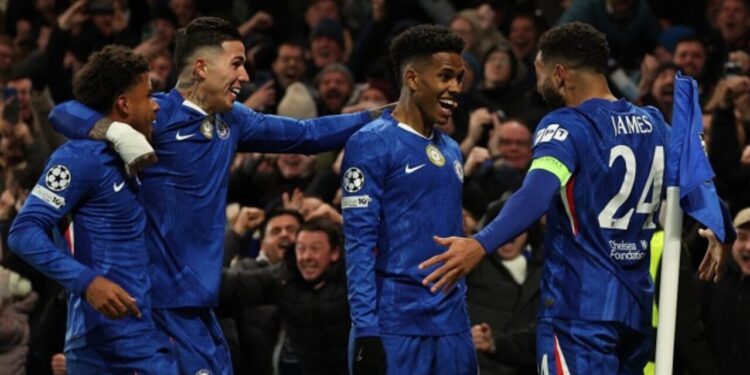 Chelsea’s Brazilian midfielder #41 Estevao (C) celebrates with teammates after scoring their second goal during the UEFA Champions League league-phase football match between Chelsea and Barcelona at Stamford Bridge in London on November 25, 2025.