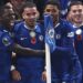 Chelsea FC players celebrating a goal