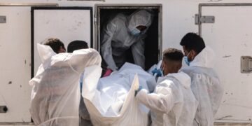 Israel Receives Remains of Three Hostages from Hamas Under Ceasefire Deal Employees of the Nasser Medical Complex unload one of the thirty bodies of Palestinian prisoners detained by Israel and released as part of the hostage exchange deal, as the body bags arrive in Khan Yunis, in the southern Gaza Strip, on October 31, 2025.