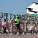 People walk along the corniche promenade in Agadir, Morocco.