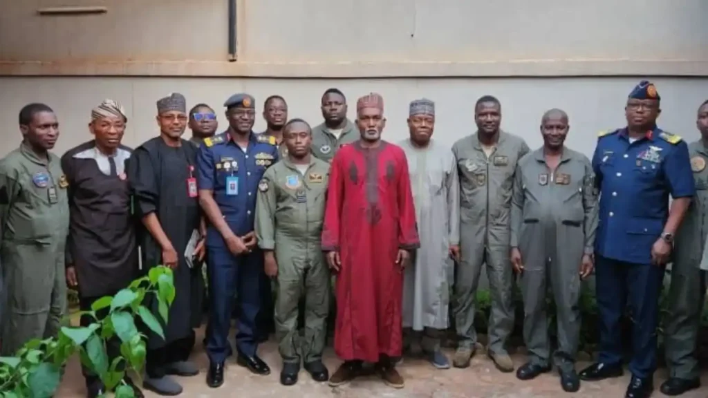 Yusuf Tuggar, meets with the 11 Nigerian Air Force personnel who were briefly detained after their aircraft made an emergency landing in Burkina Faso