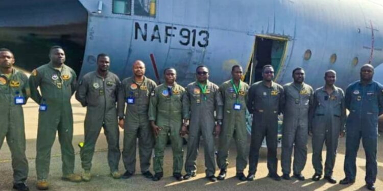 The NAF aircraft and crew members.