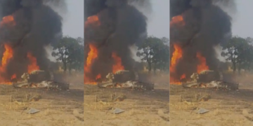 Air Force Alpha Jet Crashes in Niger State as Pilots Pull Off Heroic Escape A resident of the community views the burning air force jet that crashed.