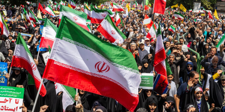 Iran Accused of Recruiting Children Amid War Iranians protesting