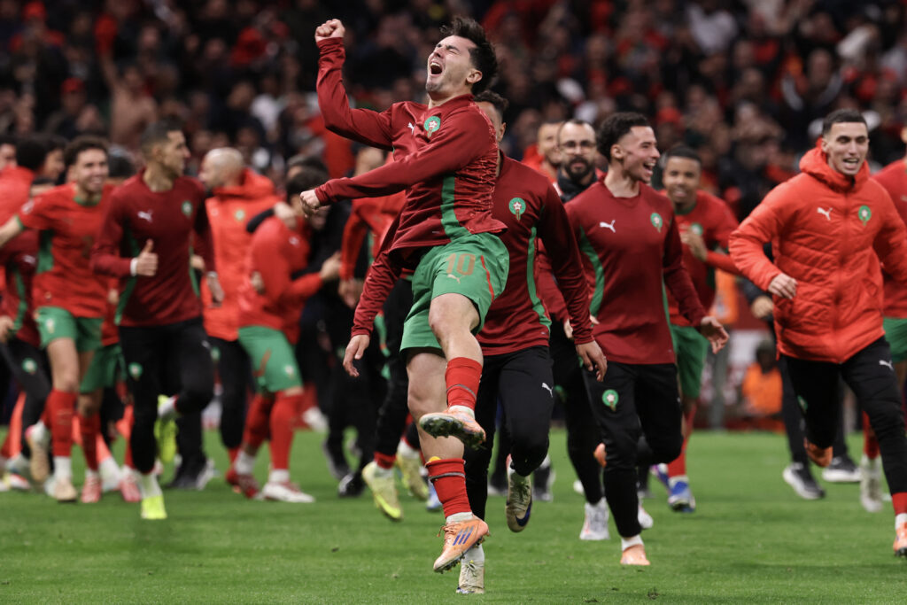 Morocco’s players celebrate after winning the Africa Cup of Nations (CAN) semi-final football match between Nigeria and Morocco at the Prince Moulay Abdellah stadium in Rabat.
