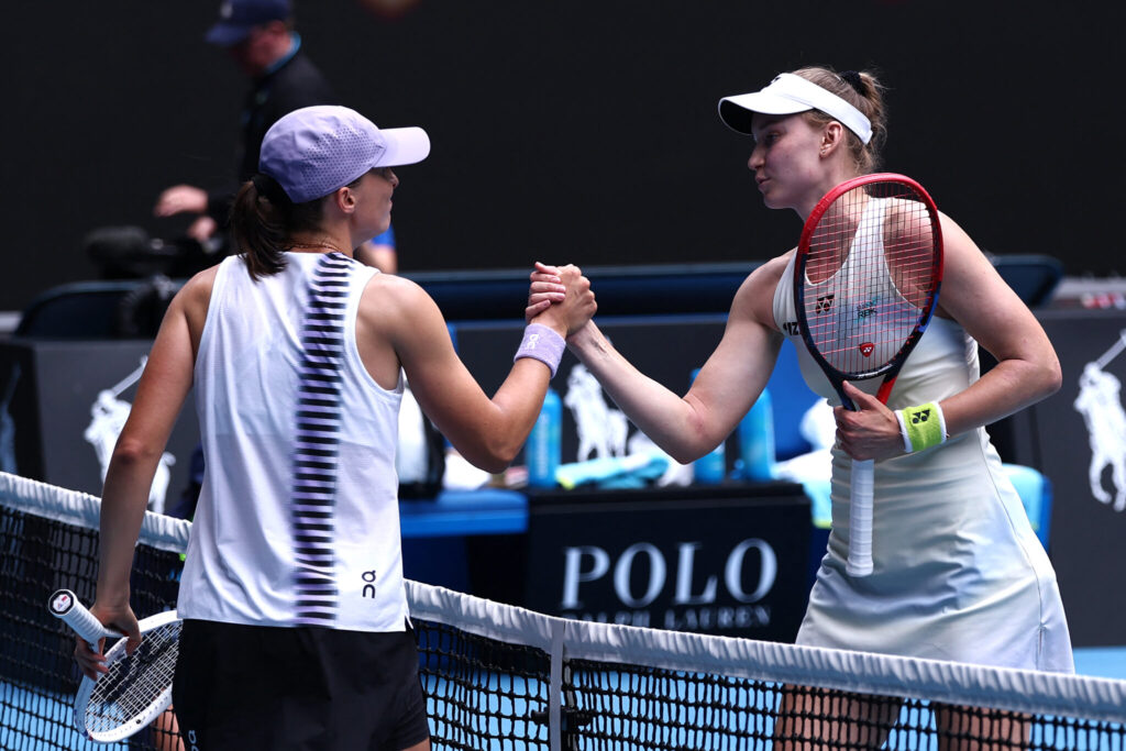 Kazakhstan’s Elena Rybakina shakes hands with Poland’s Iga Swiatek