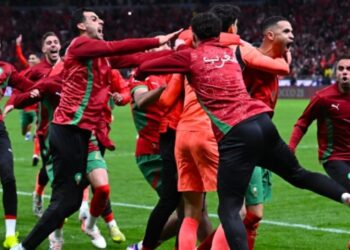 Morocco’s players celebrate after winning the Africa Cup of Nations (CAN) semi-final football match between Nigeria and Morocco at the Prince Moulay Abdellah stadium in Rabat.