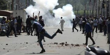 police fire teargas at protesters