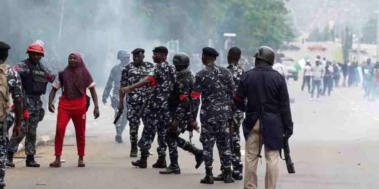 Protest Rocks Abuja Nigerian security detain a demonstrator during the protest against bad governance and economic hardship in Abuja August 1 2024. REUTERS Marvellous Durowaiye