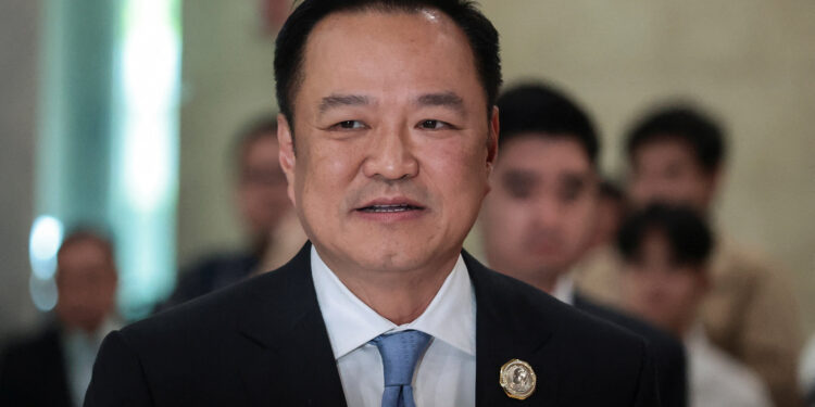 FILE PHOTO: Bhumjaithai Party leader and prime ministerial candidate Anutin Charnvirakul arrives at the parliament ahead of the vote for a new prime minister, following the Constitutional Court's removal of Prime Minister Paetongtarn Shinawatra from office for an ethics violation, in Bangkok, Thailand, September 5, 2025. REUTERS/Patipat Janthong/File photo