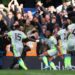 Manchester City players celebrating a goal