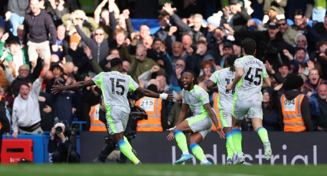 Man City Thrash Chelsea to Ignite Premier League Title Race Manchester City players celebrating a goal