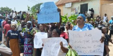 Tension at Funeral for Jos Palm Sunday Attack Victims Women and youths staged a protest outside the church, demanding the release of the three youths earlier arrested by the military.