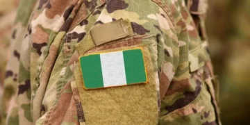 Military Sets Up Court-Martial Over Alleged Coup Plot Nigerian soldier in uniform