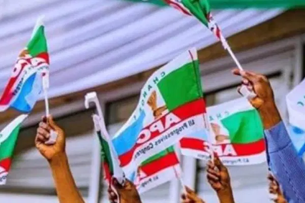 APC members holding the party's flag